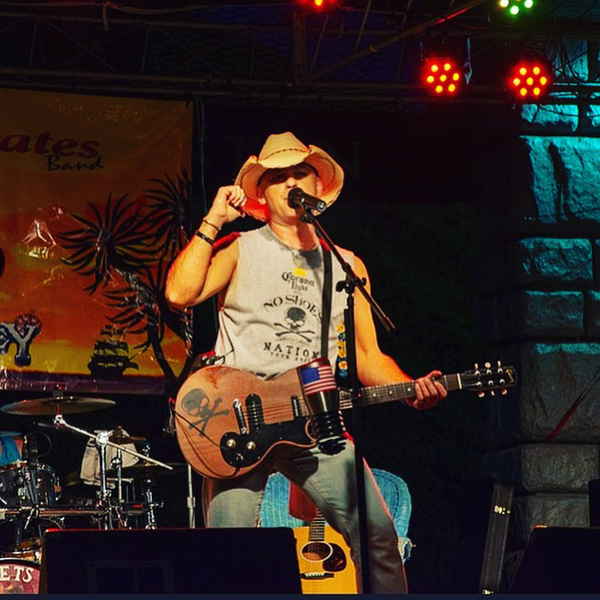 Kenny Chesney tribute band singer performing at an event | Altus Entertainment